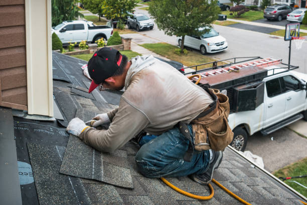 Professional Roof Repair technician working in Aultman, PA